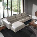 Leather upholstered chaise longue sofa with tilting backrests