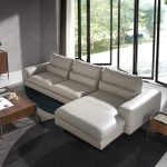 Leather upholstered chaise longue sofa with tilting backrests