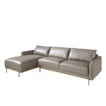 Chaise longue sofa upholstered in leather and legs in darkened steel.