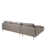 Chaise longue sofa upholstered in leather and legs in darkened steel.