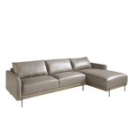 Chaise longue sofa upholstered in leather and legs in darkened steel.
