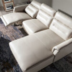 Sofa chaise longue upholstered in leather and relax mechanism