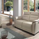 2 seater sofa upholstered in grey leather and relax mechanisms