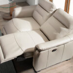 2 seater sofa upholstered in grey leather and relax mechanisms