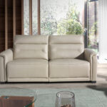 3 seater sofa upholstered in grey leather and relax mechanisms