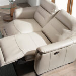 3 seater sofa upholstered in grey leather and relax mechanisms