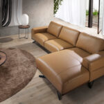 Leather upholstered chaise longue sofa with black steel legs