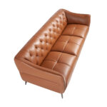 3 seater tufted sofa upholstered in leather
