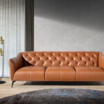 3 seater tufted sofa upholstered in leather