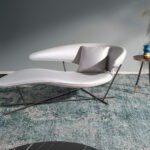 Sofa upholstered in blue eco-leather and black steel