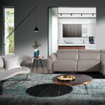 Sofa upholstered in blue eco-leather and black steel