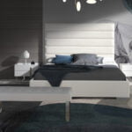 White wooden bedside table and chrome steel