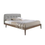 Bed upholstered in fabric with Walnut wood frame