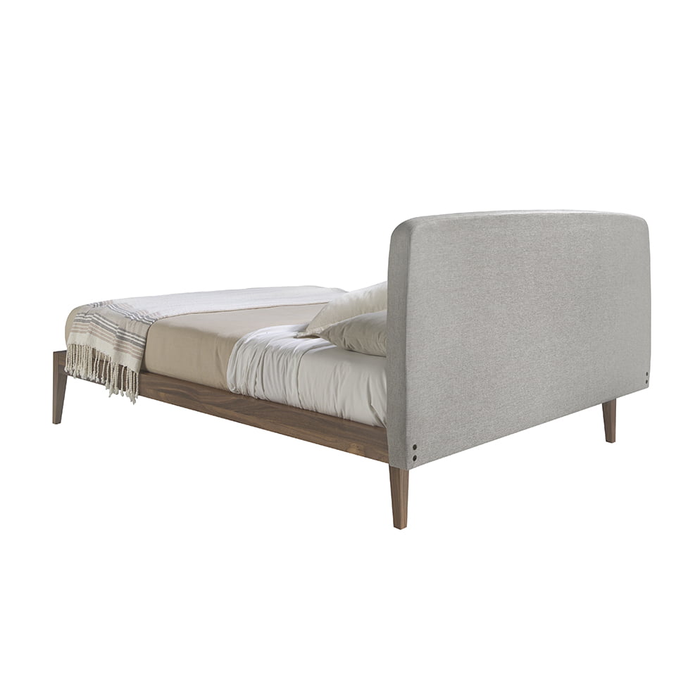 Bed upholstered in fabric with Walnut wood frame