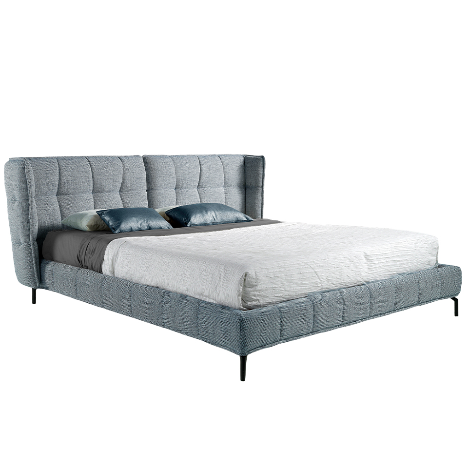 Letto trapuntato in tessuto blu e bianco