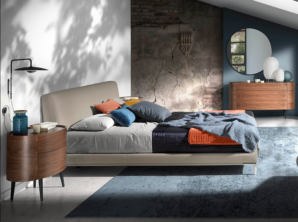 Upholstered bed with stainless steel legs Upholstered bed with stainless steel legs