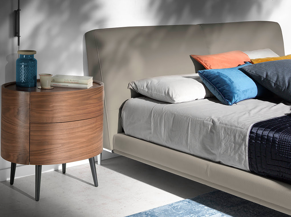 Upholstered bed with stainless steel legs Upholstered bed with stainless steel legs