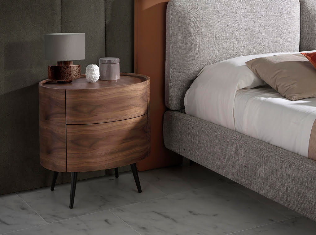 Bed upholstered in fabric and eco-leather with stainless steel legs Bed upholstered in fabric and eco-leather with stainless steel legs