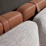 Bed upholstered in fabric and eco-leather with stainless steel legs