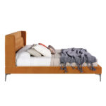 Upholstered bed upholstered in velvet fabric with polished steel legs