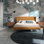 Upholstered bed upholstered in velvet fabric with polished steel legs