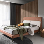 Upholstered bed in brown and grey eco-leather with steel legs