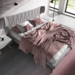 Кровать из светло-серой ткани