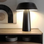 Table lamp made of stainless steel lacquered in black color