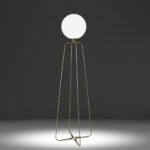 Floor lamp with base made of golden steel and white tinted glass bulb.