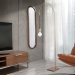 Height adjustable floor lamp in golden epoxy steel