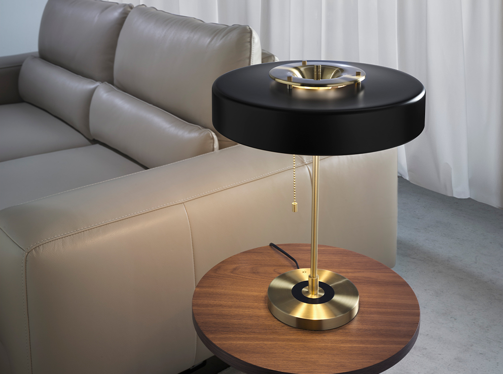 Table lamp in gold-plated aluminium and black aluminium