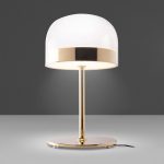 Table lamp in gilded steel with translucent glass shade