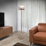 Floor lamp in gold-plated steel and clear glass