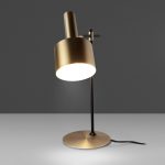 Table lamp in gold-plated aluminium and black steel