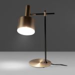 Table lamp in gold-plated aluminium and black steel