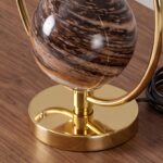 Patterned glass and gold-coloured steel table lamp