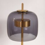Black smoked glass and polished gold-coloured steel floor lamp