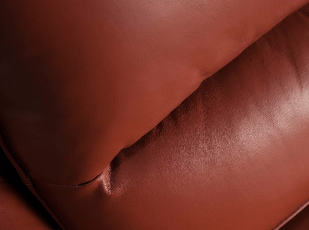 Armchair upholstered in leather and black steel legs Armchair upholstered in leather and black steel legs