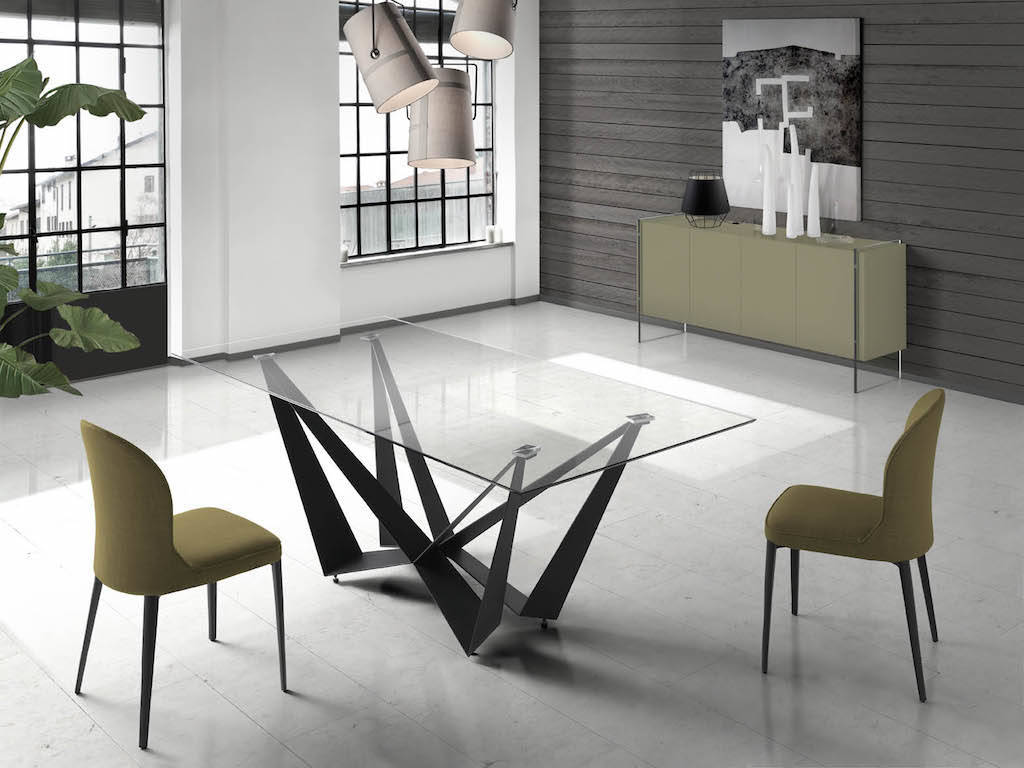 Chair upholstered in fabric with a steel structure. Chair upholstered in fabric with a steel structure.