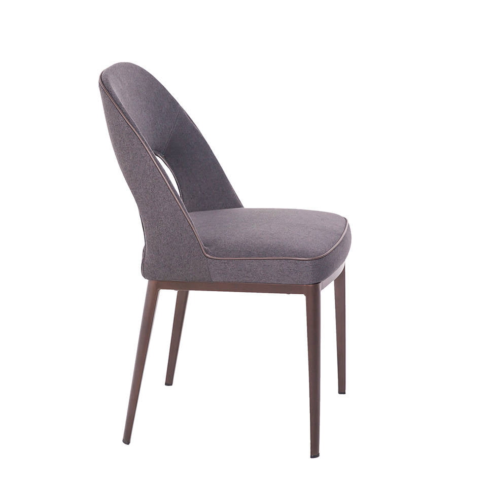 Chair upholstered in cloth with a steel structure. Chair upholstered in cloth with a steel structure.