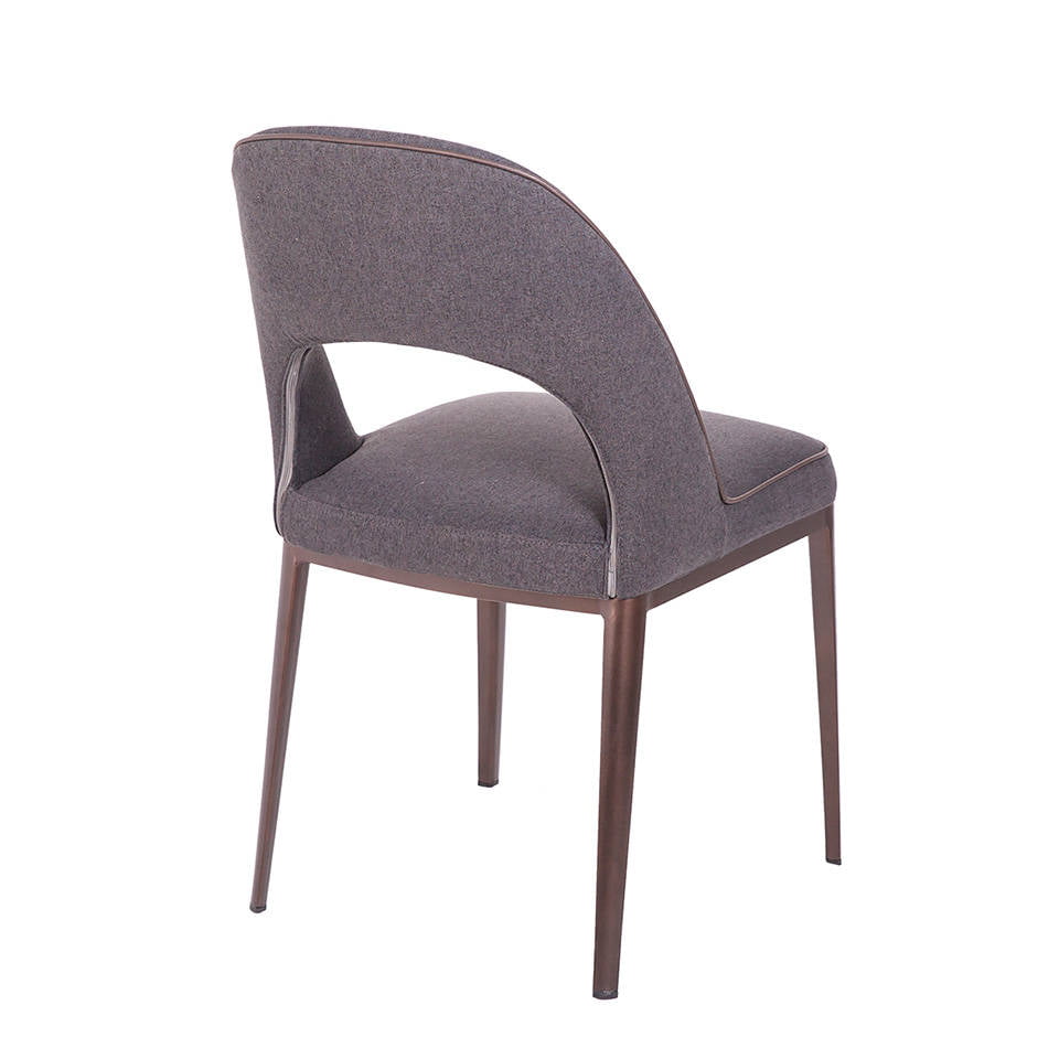 Chair upholstered in cloth with a steel structure. Chair upholstered in cloth with a steel structure.