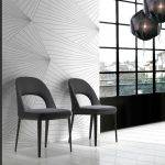Chair upholstered in fabric with steel frame