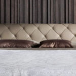 Bed upholstered in leatherette