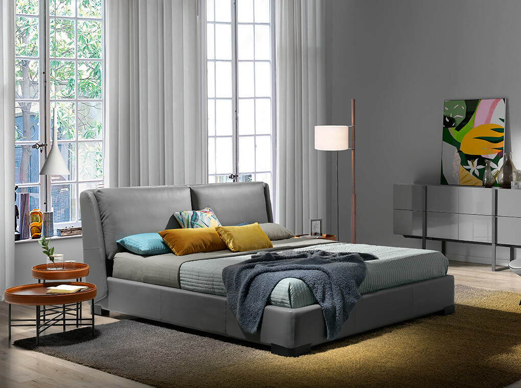 King size Bed upholstered with dark grey painted steel legs King size Bed upholstered with dark grey painted steel legs