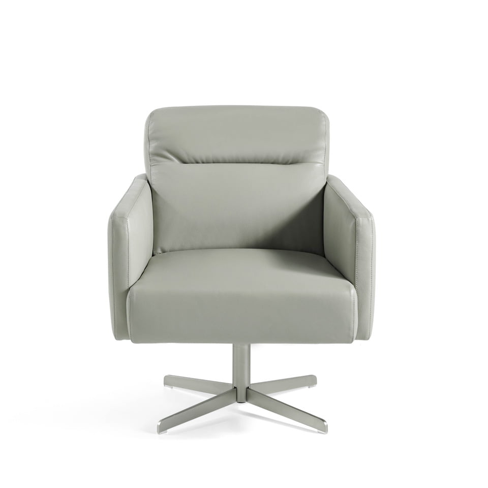 Swivel armchair upholstered in cowhide leather Swivel armchair upholstered in cowhide leather