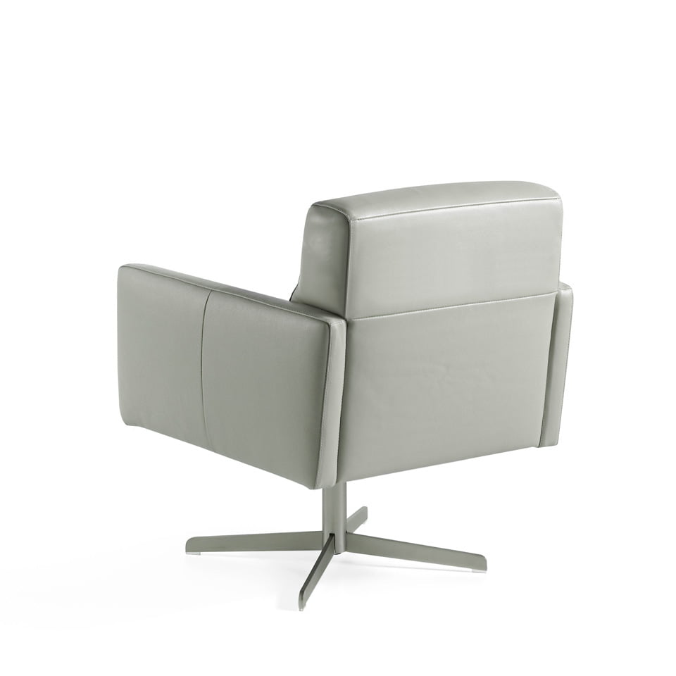 Swivel armchair upholstered in cowhide leather Swivel armchair upholstered in cowhide leather