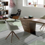Swivel leather upholstered ottoman
