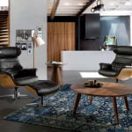 Swivel relax armchair upholstered in leather