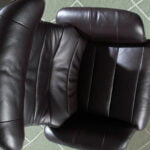Swivel relax armchair upholstered in leather