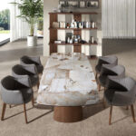 Mesa comedor extensible ovalada barril mármol porcelánico y nogal